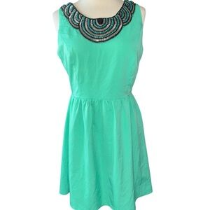 Emmalee dress sleeveless fully lined zipper in back heavily beaded Sz Medium NWT